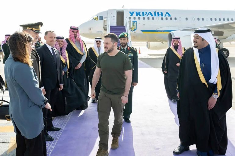 In this photo provided by Saudi Press Agency, SPA, Ukrainian President Volodymyr Zelenskyy arrives at King Khalid International Airport, in Riyadh, Saudi Arabia, Tuesday, Feb. 27, 2024. (Saudi Press Agency via AP)