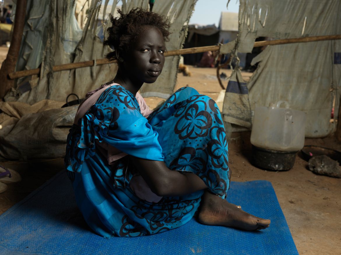 Portrait of Nyasebit 13, who lost her Mother in the Sudan war.