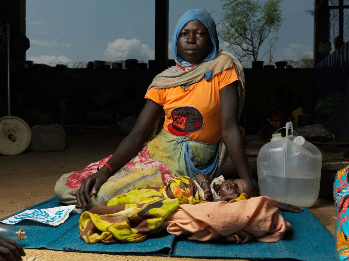 Sudanese refugee Ayen Akol with her baby