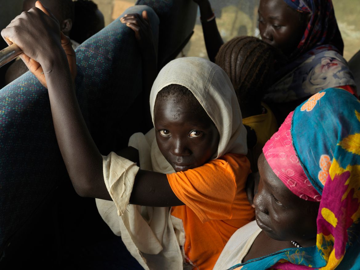Sara Zarouq and Hiba Rayan on board transport from Renk reception centre to the rcamps for new arrivals in Maban.