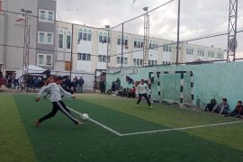 Displaced Palestinians participate in a Ramadan football tournament at Al-Salah Football Club in Gaza [Abubaker Abed/Al Jazeera]