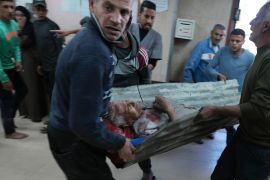 Palestinians wounded in the Israeli bombardment are brought to Al-Aqsa Martyrs Hospital in Deir al Balah [Adel Hana/AP Photo]