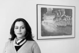 Malak Mattar, pictured with her 2023 artwork entitled Death Road [Courtesy of Sarah Booker]