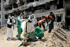Rescue workers and medics search for bodies inside al-Shifa Hospital after Israel&#039;s withdrawal from the largest medical facility in the Gaza Strip [Dawoud Abu Alkas/Reuters]