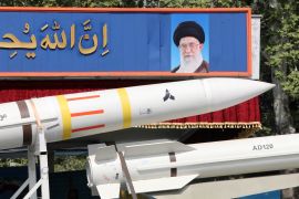 An Iranian military truck carries parts of a Sayad 4-B missile past a portrait of supreme leader Ayatollah Ali Khamenei during a military parade as part of a ceremony marking the country&#039;s annual army day in Tehran on April 17, 2024 [Atta Kenare/AFP]
