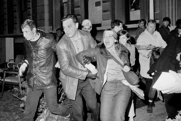 A student protester at Columbia University is forcibly removed from the campus, April 30, 1968, by plainclothes New York City police after they entered buildings occupied by the students, and ejected those participating in the sit-ins.
