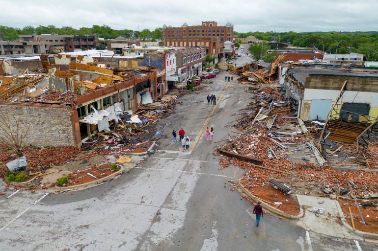 An aerial view of Sulphur after the tornadoes swept through. Some buildings are piles of rubble. Most are without a roof.