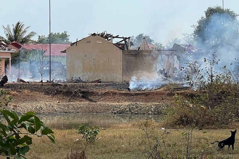 Smoke billows from warehouse at the army base in Kampong Speu