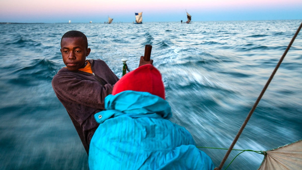 As fisheries collapse due to overfishing and climate change, Madagascar fishermen migrate further out to find fish.