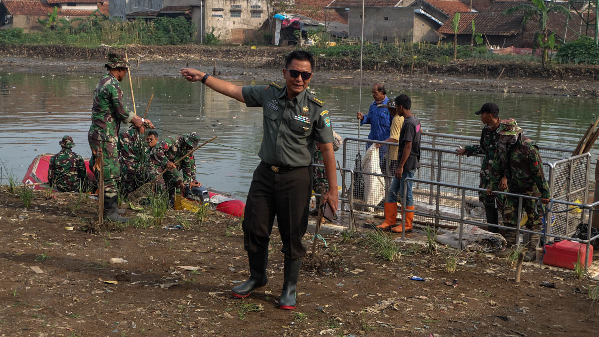 Citarum is divided into 23 sectors for the clean-up programme. Yudi Zanibar is the military commander of sector IV and he is in charge of cleaning 14km stretch of the river. He says every day endless piles of trash enter his territory. [Syarina Hasibuan/Al Jazeera]