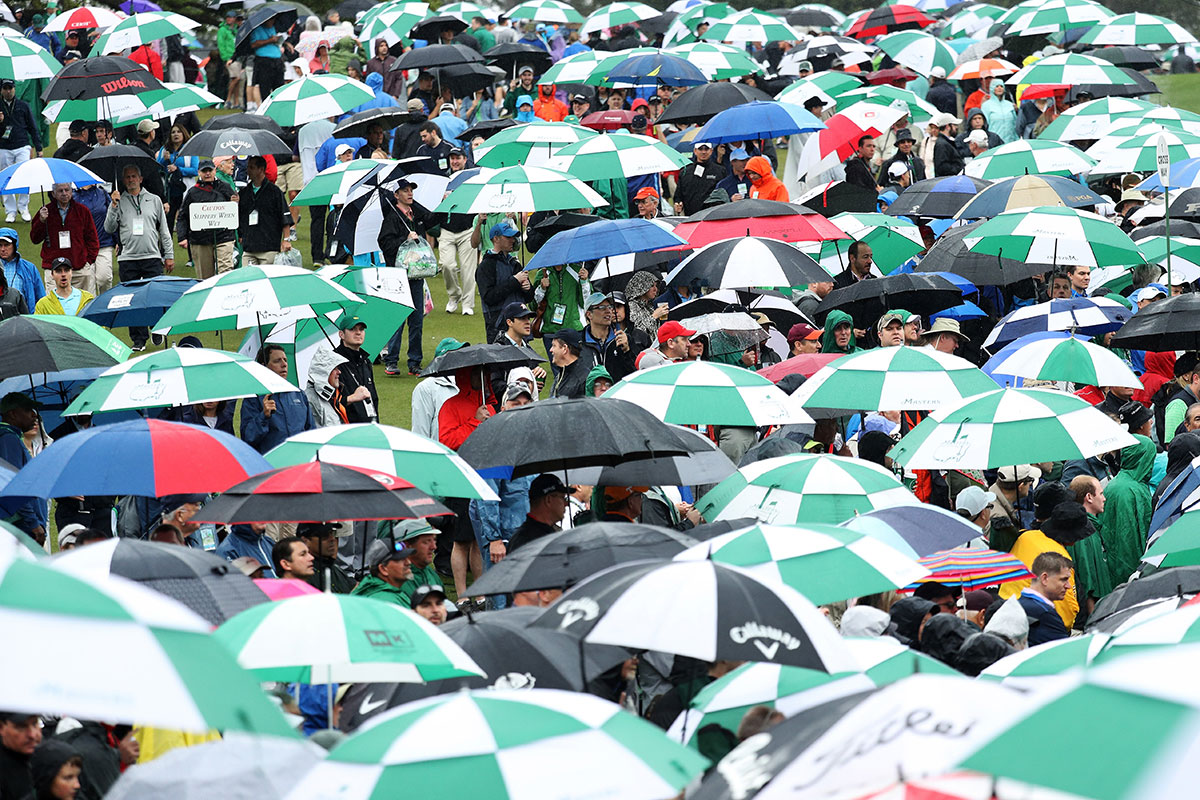In US state of Georgia, there is an entire sea of umbrellas at the 3rd round of the Golf Masters [Patrick Smith/AFP]