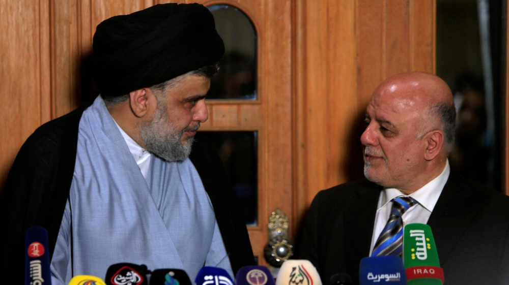 Iraqi PM al-Abadi and Shia leader al-Sadr announce alliance
