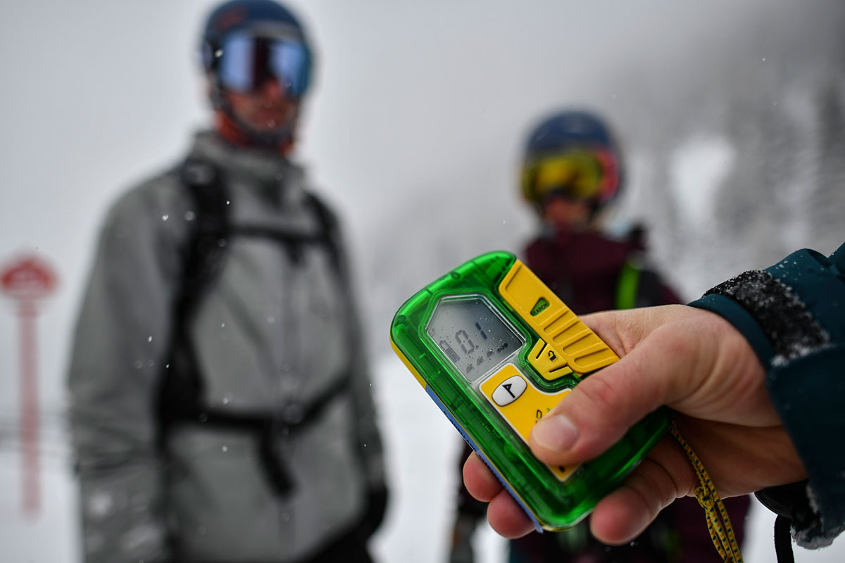 Backcountry skiers check their avalanche beacons at a ski resort in Lermoos, Austria. [Philipp Guelland/EPA]