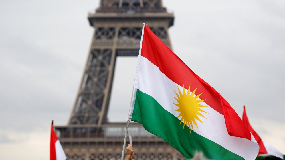 Flags of Kurdistan are pictured as Kurdish protesters attends a demonstration against Turkey's military action in northeastern Syria, in Paris, France, October 12, 2019