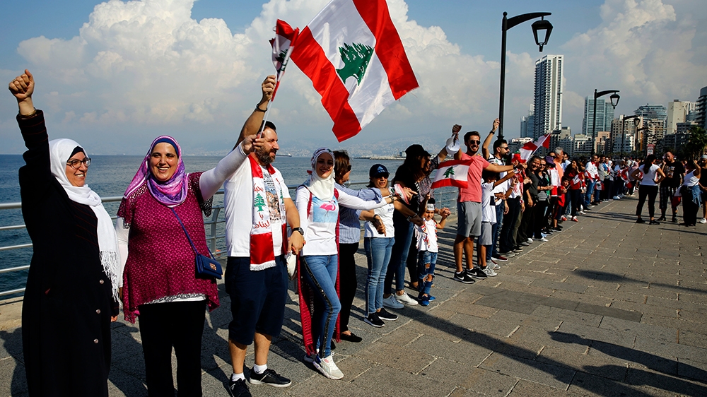 Lebanon protesters form human chain across the country