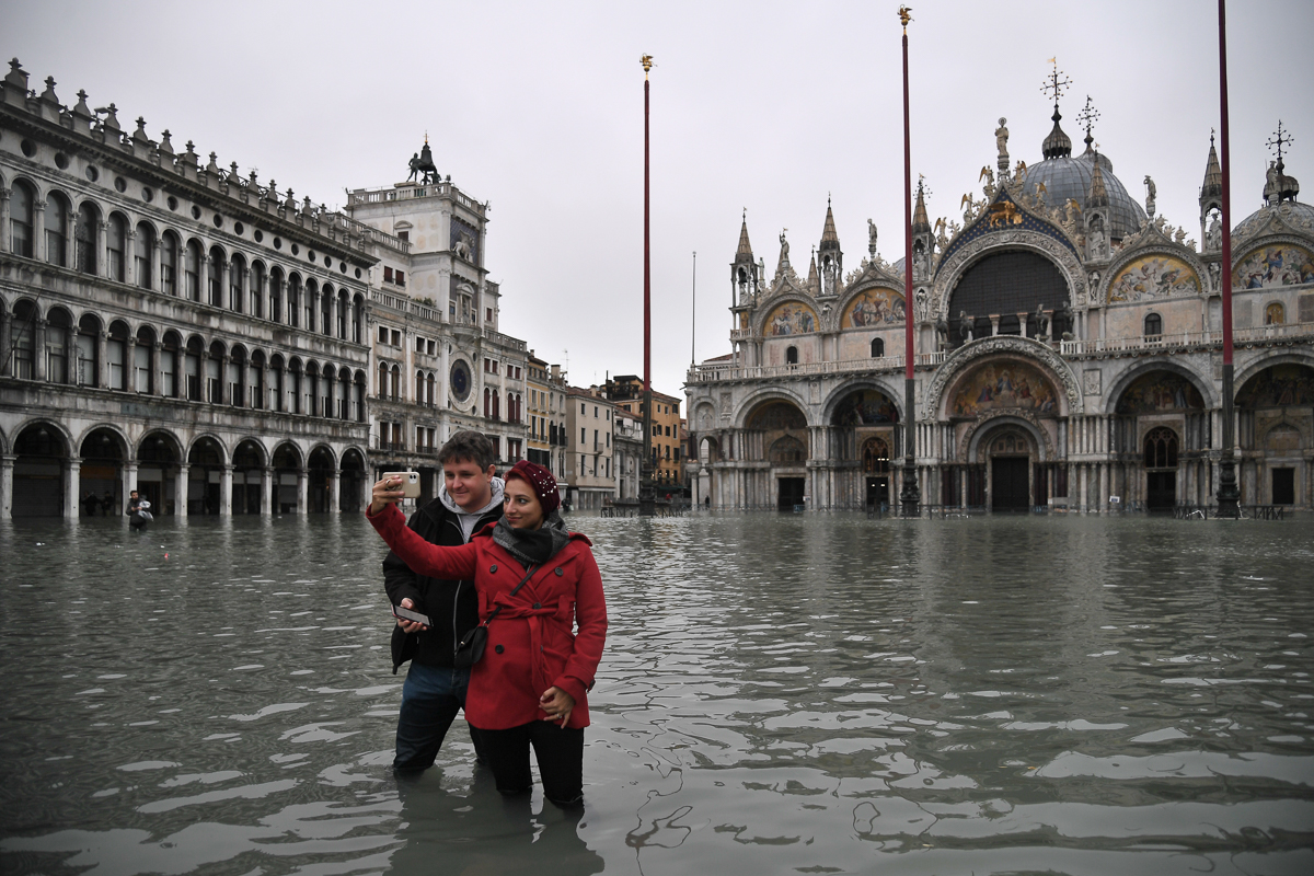 In Pictures Venice flooded by recordhigh tide Italy Al Jazeera