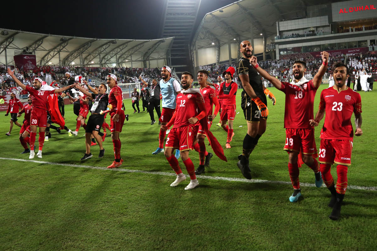 Bahraini players celebrating their victory after the final whistle of the match. [Showkat Shafi/Al Jazeera]