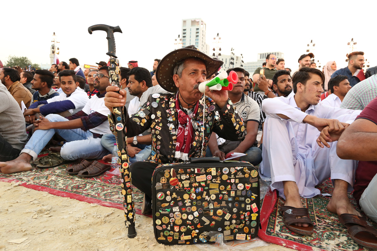 Crowds gathered at several specially-built giant screens around Doha to watch the match against Japan. [Showkat Shafi/Al Jazeera]