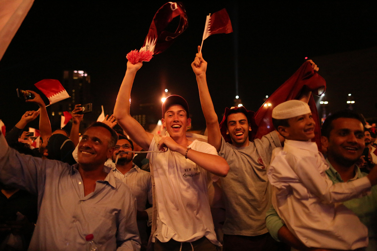 Thousands cheered for the Maroons in Doha, watching the game on large outdoor screens. [Showkat Shafi/Al Jazeera]