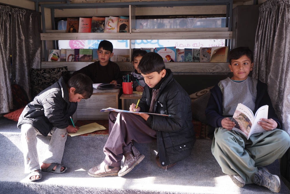 More than 40,000 visits have been registered at the mobile library since it started operating in 2018. [Sorin Furcoi/Al Jazeera]