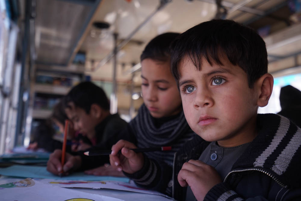 'It's been one year since we started working with children and we realised they are very passionate and they have so much energy and thirst for knowledge,' said Freshta. [Sorin Furcoi/Al Jazeera]