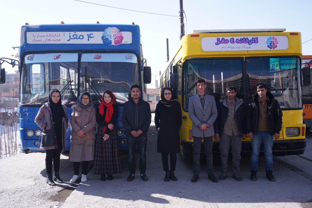 An eight-member team works on the Charmaghaz project. As they couldn't afford to buy their own vehicles, the local transport authority provided two buses for the project. [Sorin Furcoi/Al Jazeera]