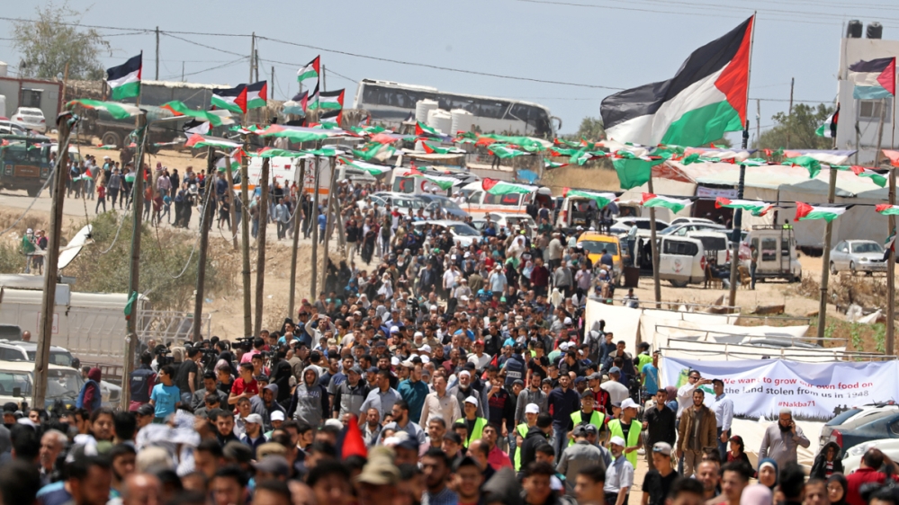 Palestinians gather during a protest marking the 71st anniversary of the 'Nakba', or catastrophe, when hundreds of thousands fled or were forced from their homes in the war surrounding Israel's indepe