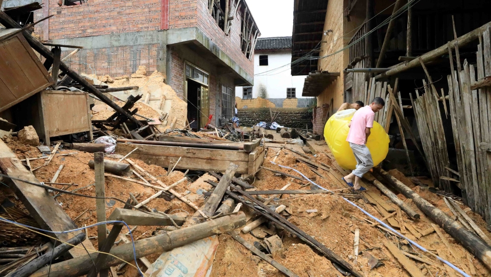China flood death toll jumps to 61: Ministry