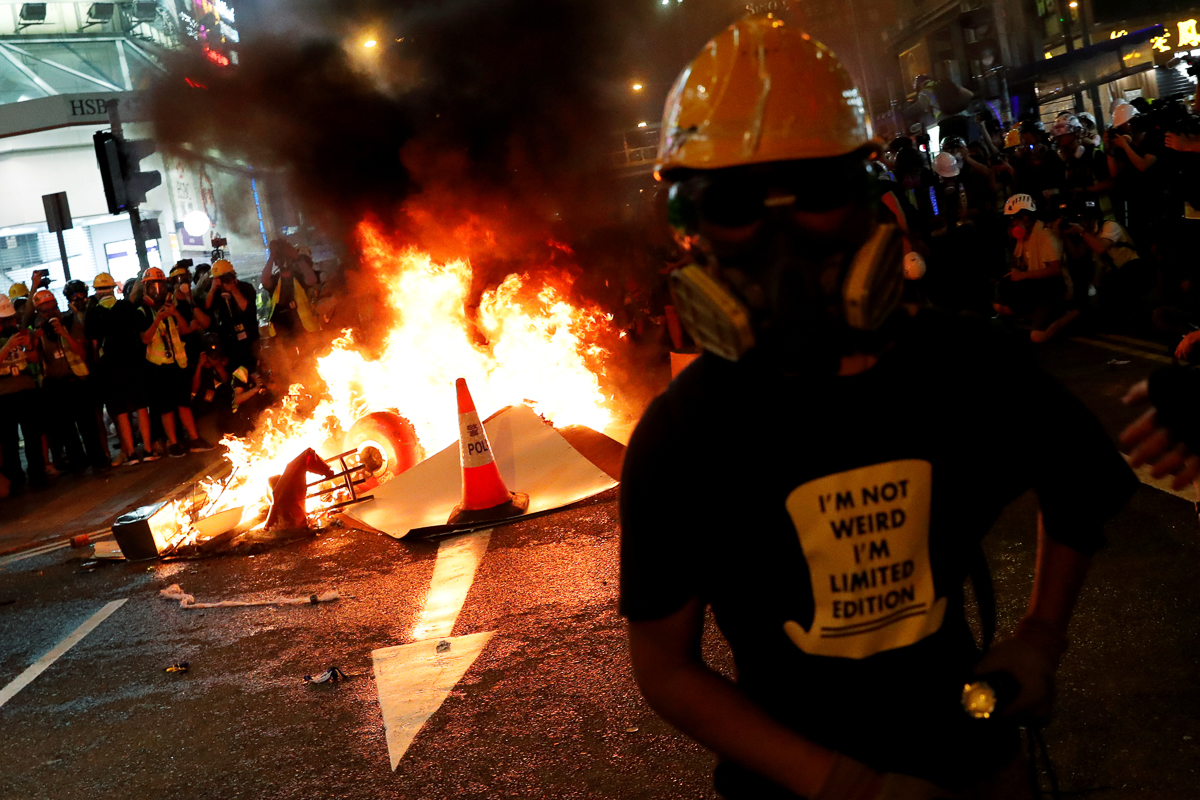 Police said the protesters were 'seriously paralysing traffic and affecting emergency services'. [Tyrone Siu/Reuters]