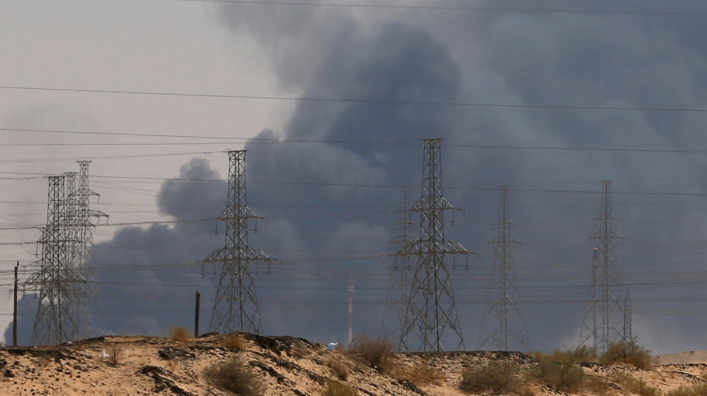 Smoke is seen following a fire at an Aramco factory in Abqaiq