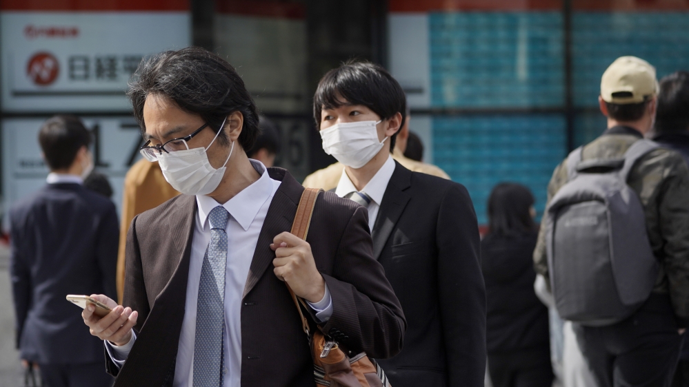 Japan's Abe says Olympics to be held despite coronavirus pandemic