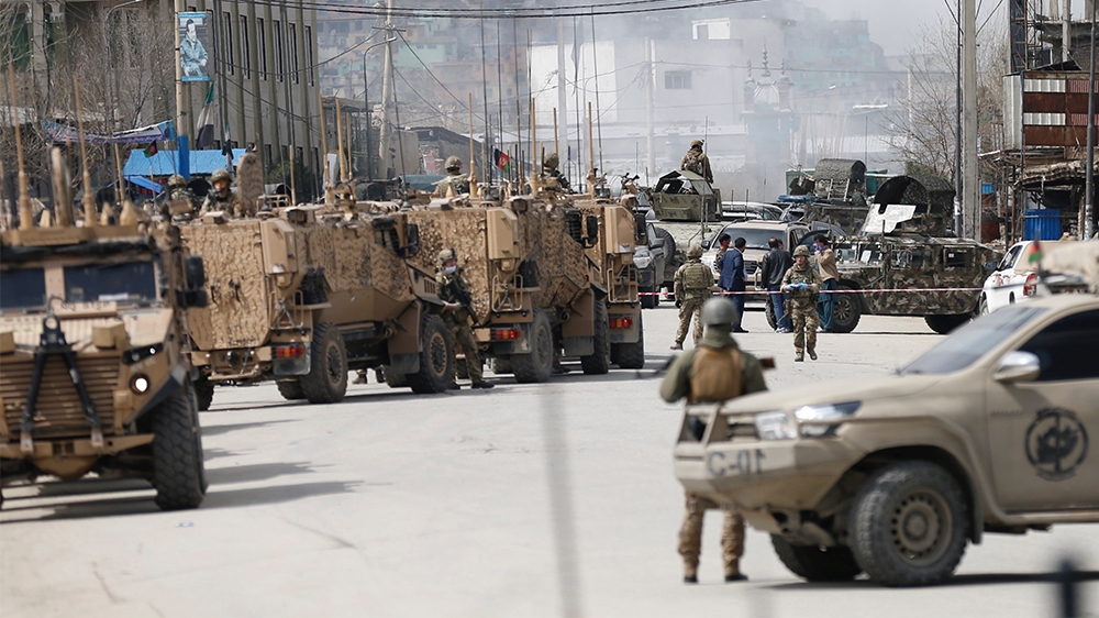 Afghan security forces inspect near the site of an attack in Kabul, Afghanistan March 25, 2020.REUTERS/Mohammad Ismail