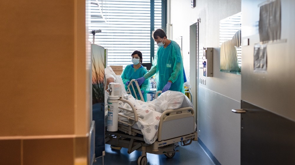 A staff moves a patient during a media visit of the Swiss Army deployment at Pourtales Hospital during the coronavirus disease (COVID-19) outbreak in Neuchatel, Switzerland, 