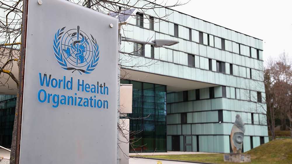 FILE PHOTO: A logo is pictured outside a building of the  World Health Organization (WHO) during an executive board meeting on update on the coronavirus outbreak, in Geneva, Switzerland, February 6, 2