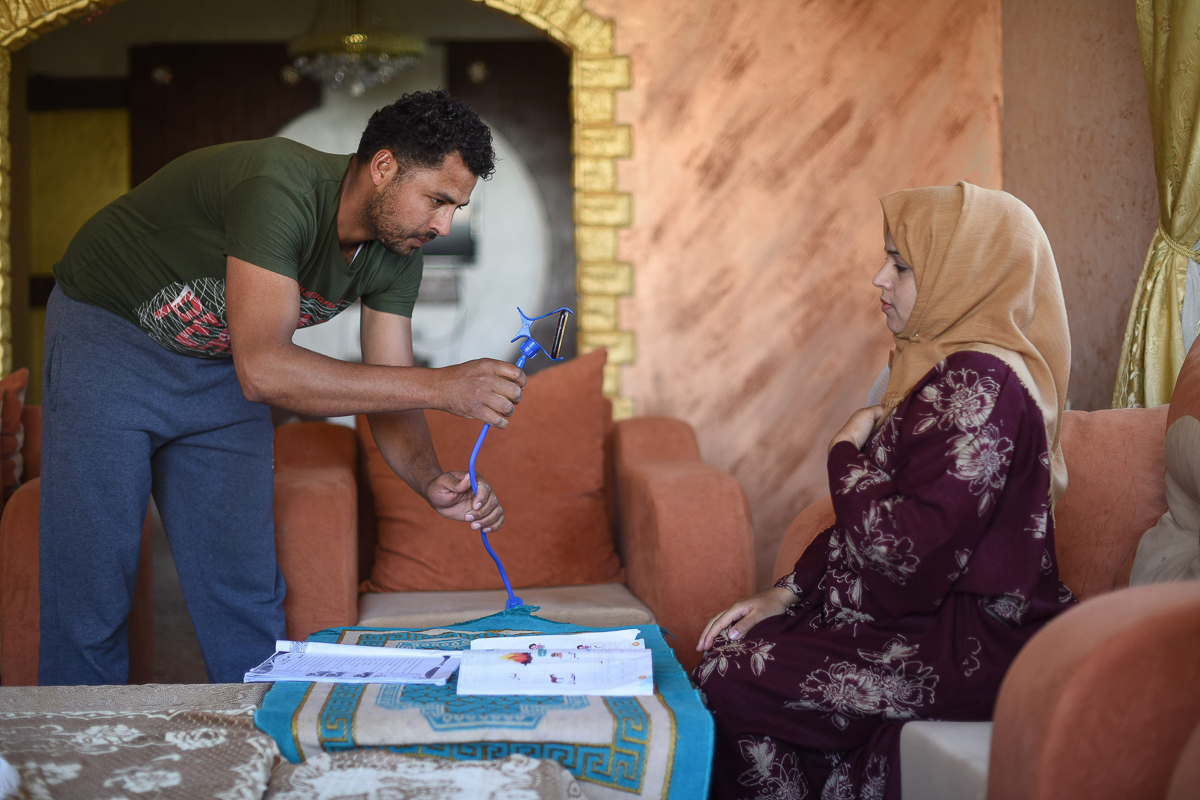 With the help of her husband, kindergarten teacher Nidaa Abu Dabha, 30, records educational videos for her students and then sends them via WhatsApp to parents' groups. "I am proud of my job and the creative alternatives we use to help our children receive their education under all circumstances," she says. [Abed Zagout/ICRC]