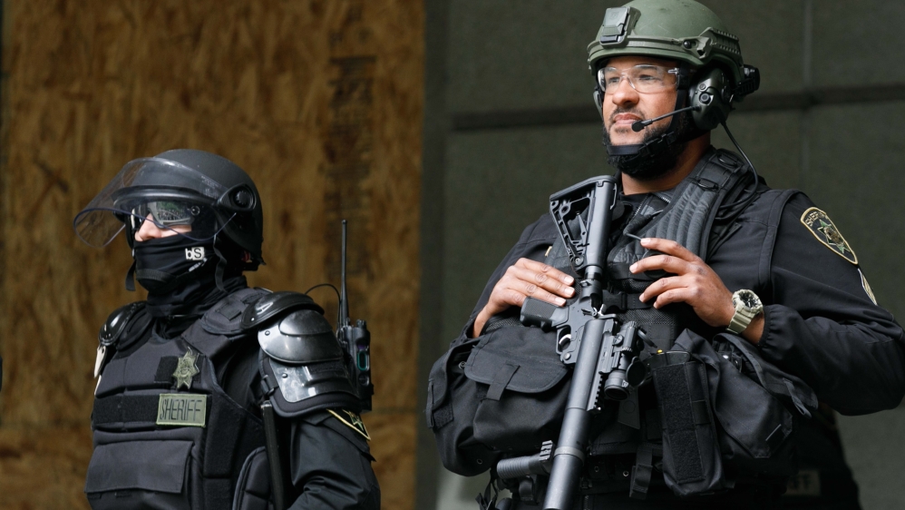 US: Portland calm as federal agents hand over to local police - Al Jazeera English