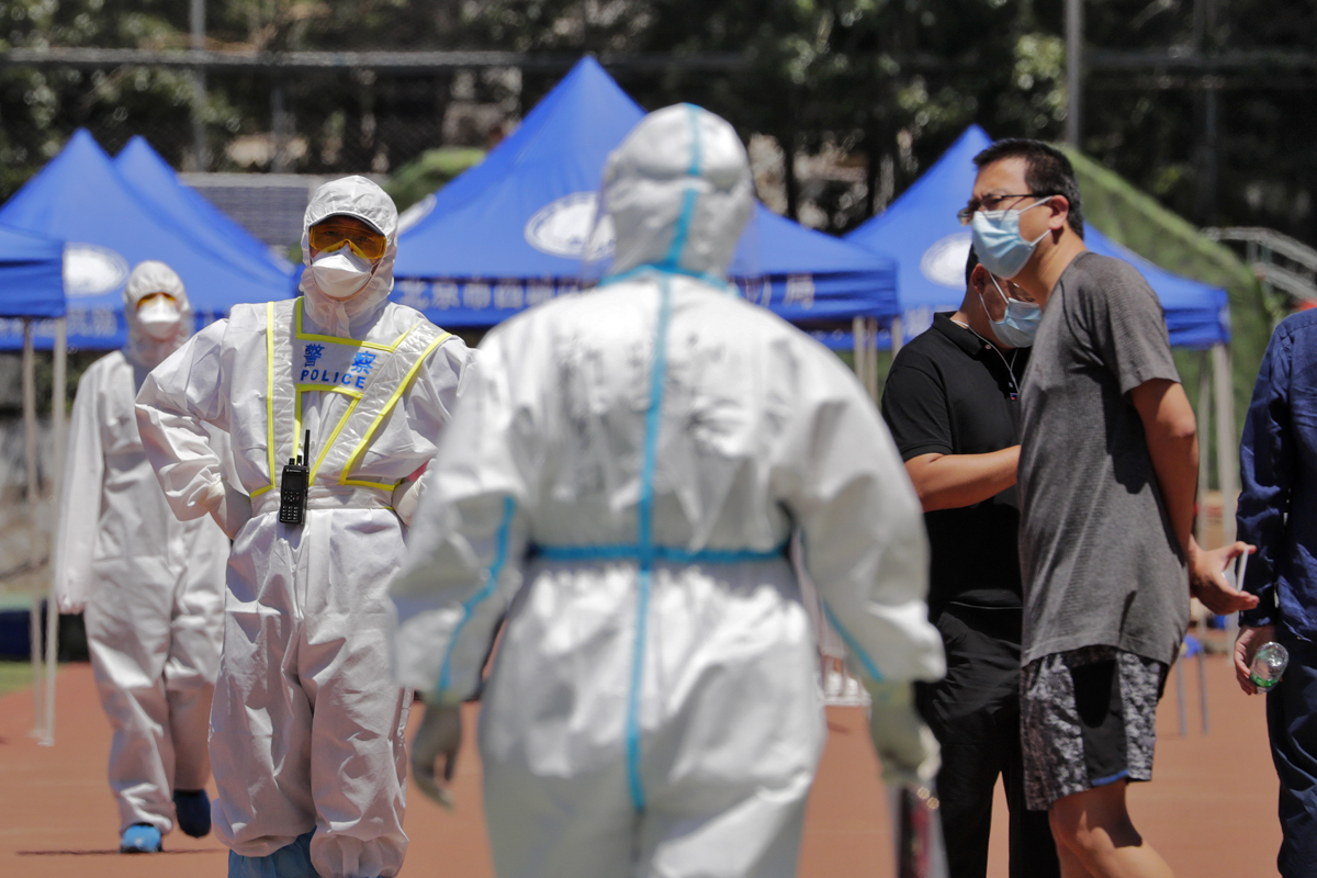 Officials have said they plan to administer tests to 46,000 residents in the area. More than 10,000 people have been tested already. [Andy Wong/AP Photo]