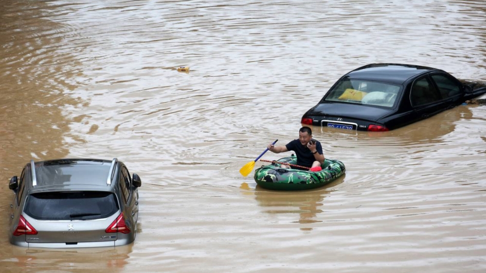 'Grim': China battles record flooding after torrential downpours - Al Jazeera English