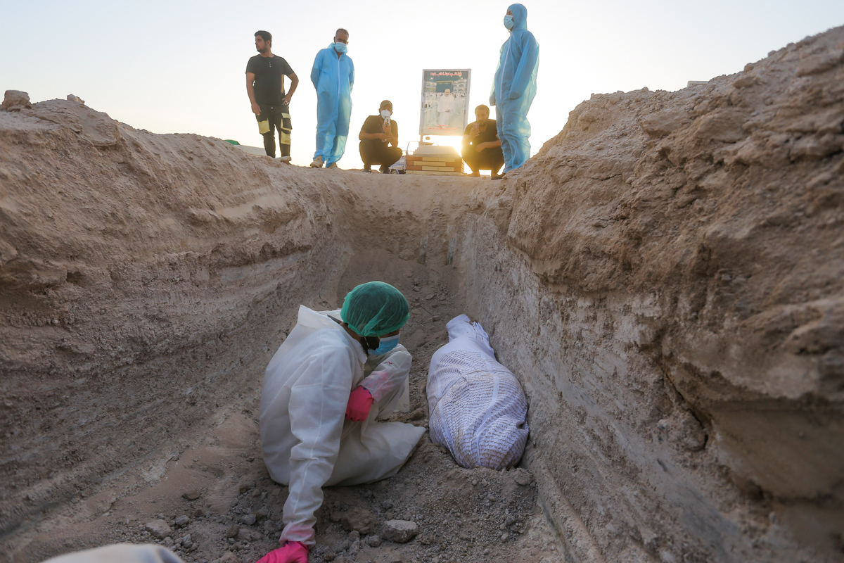 In Pictures: Lonely burials for coronavirus victims in Iraq | | Al Jazeera