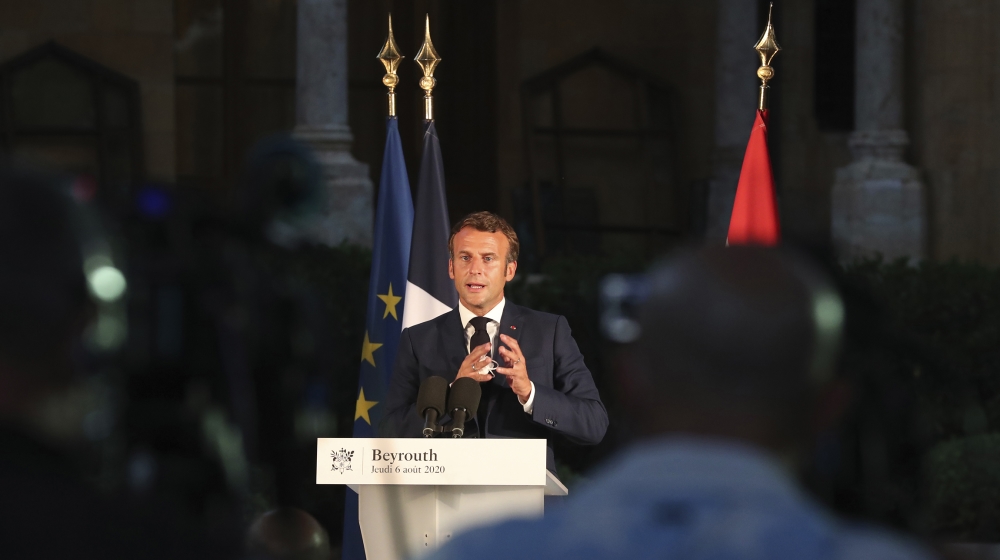 French President Emmanuel Macron delivers his speech during a press conference in Beirut, Lebanon, Thursday Aug.6, 2020. The blast, which killed more than 130 people, wounded thousands and left tens o