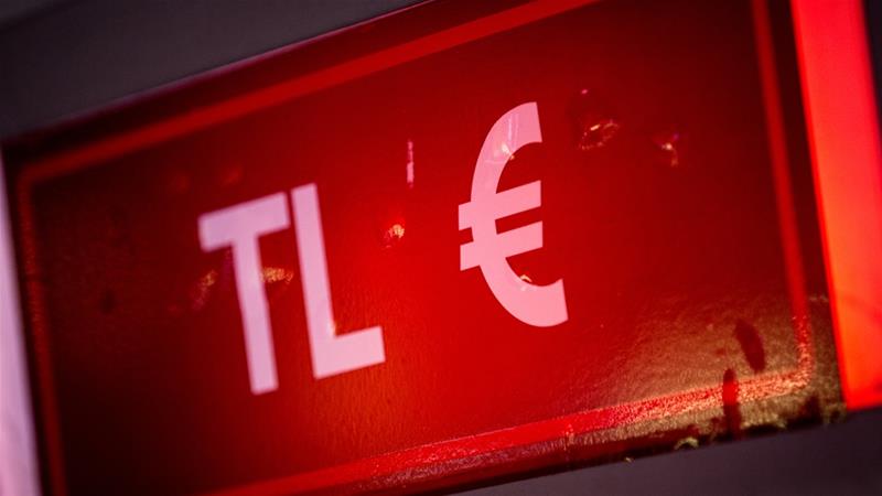 Sign showing acronym for Turkey's lira and European Union's euro [Getty Images]