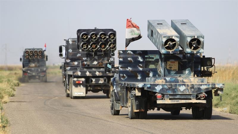 Iraqi forces drive towards Peshmerga positions on the southern outskirts of Kirkuk [Ahmad al-Rubaye/AFP/Getty Images]