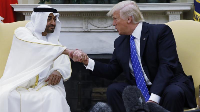 Abu Dhabi's Crown Prince Sheikh Mohammed bin Zayed al-Nahyan shakes hands with US President Donald Trump [File: Reuters]