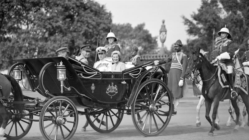 Lord Louis Mountbatten, the last Viceroy of India, and his wife, Lady Edwina Mountbatten, ride in the state carriage towards the Viceregal lodge in New Delhi, on March 22, 1947 [File: AP]