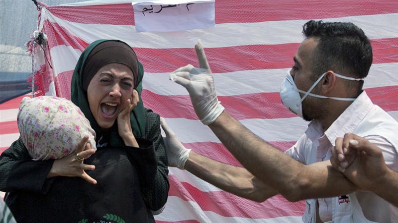 Palestinian woman reacts after Israeli soldiers shot and killed dozens of Palestinians earlier this month [Dusan Vranic/AP]