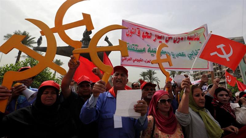 The Communist Party joined an unlikely electoral alliance with al-Sadr and other secular groups [File: Ali Abbas/EPA]