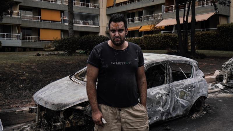 Andreas Panagiotaros was in his flat when he first heard loud booms outside early on Monday evening [Nick Paleologos/SOOC/Al Jazeera]