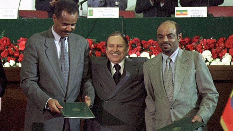 Algerian President Abdelaziz Bouteflika with Ethiopian PM Meles Zenawi and Eritrean President Isaias Afwerki after the signing of a peace agreement on December 12, 2000, in Algiers [AP]