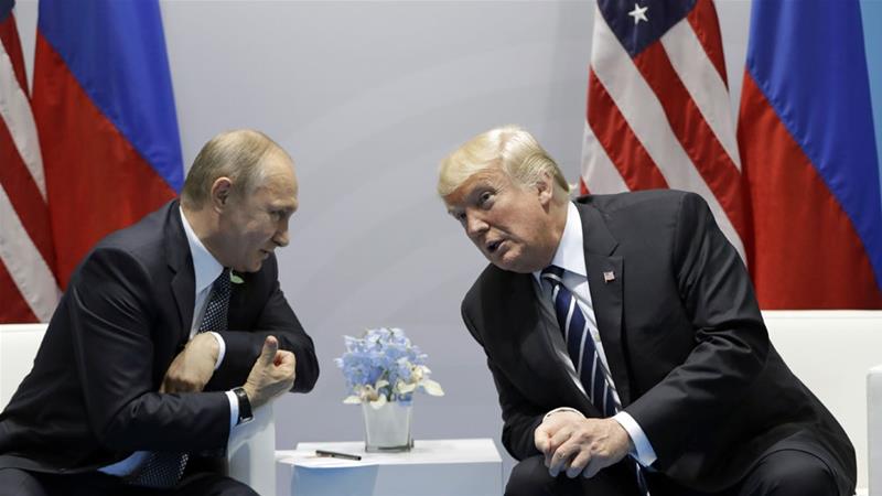 Trump met Russian President Vladimir Putin at the G20 Summit in Hamburg in 2017 [Evan Vucci/AP]