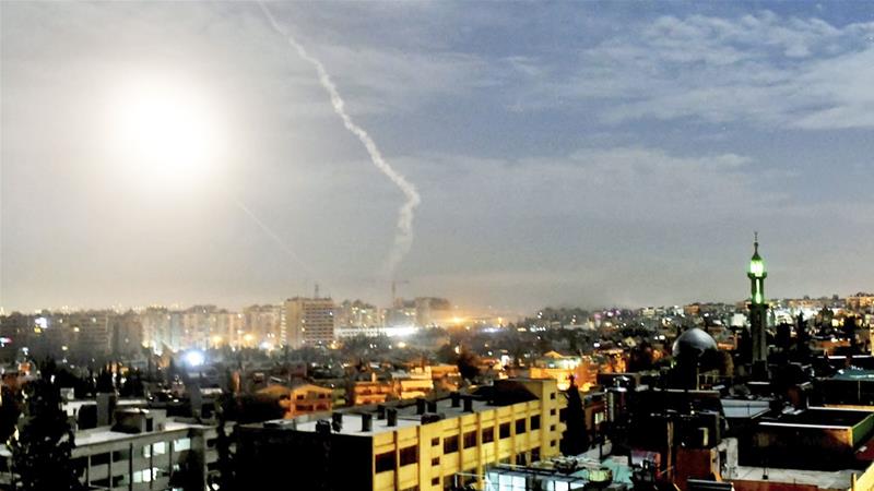 Missiles were seen flying over Damascus near the capital's international airport on Monday [SANA via AP]